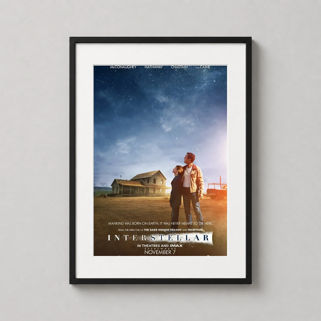 Interstellar 2014 Christopher Nolan — theatrical poster showcasing Cooper and Murph by their farmhouse