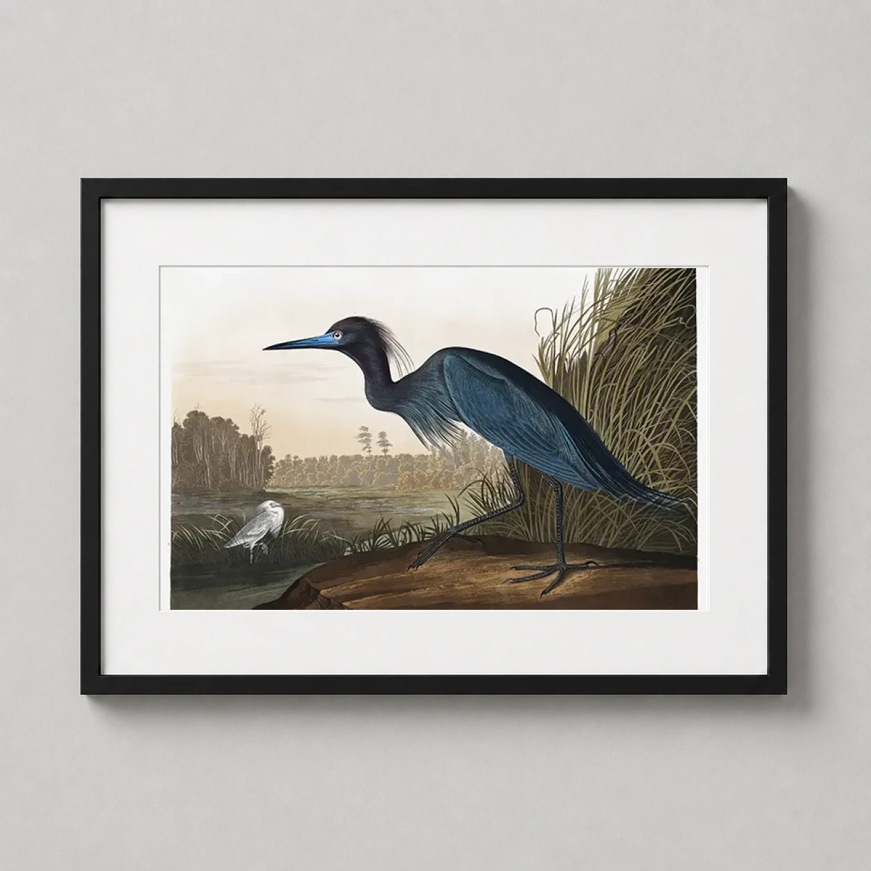 Room mockup of Audubon Blue Crane or Heron Illustration Wall Art Print, displayed as framed wall art in a bedroom setting as a landscape print with blue tones.