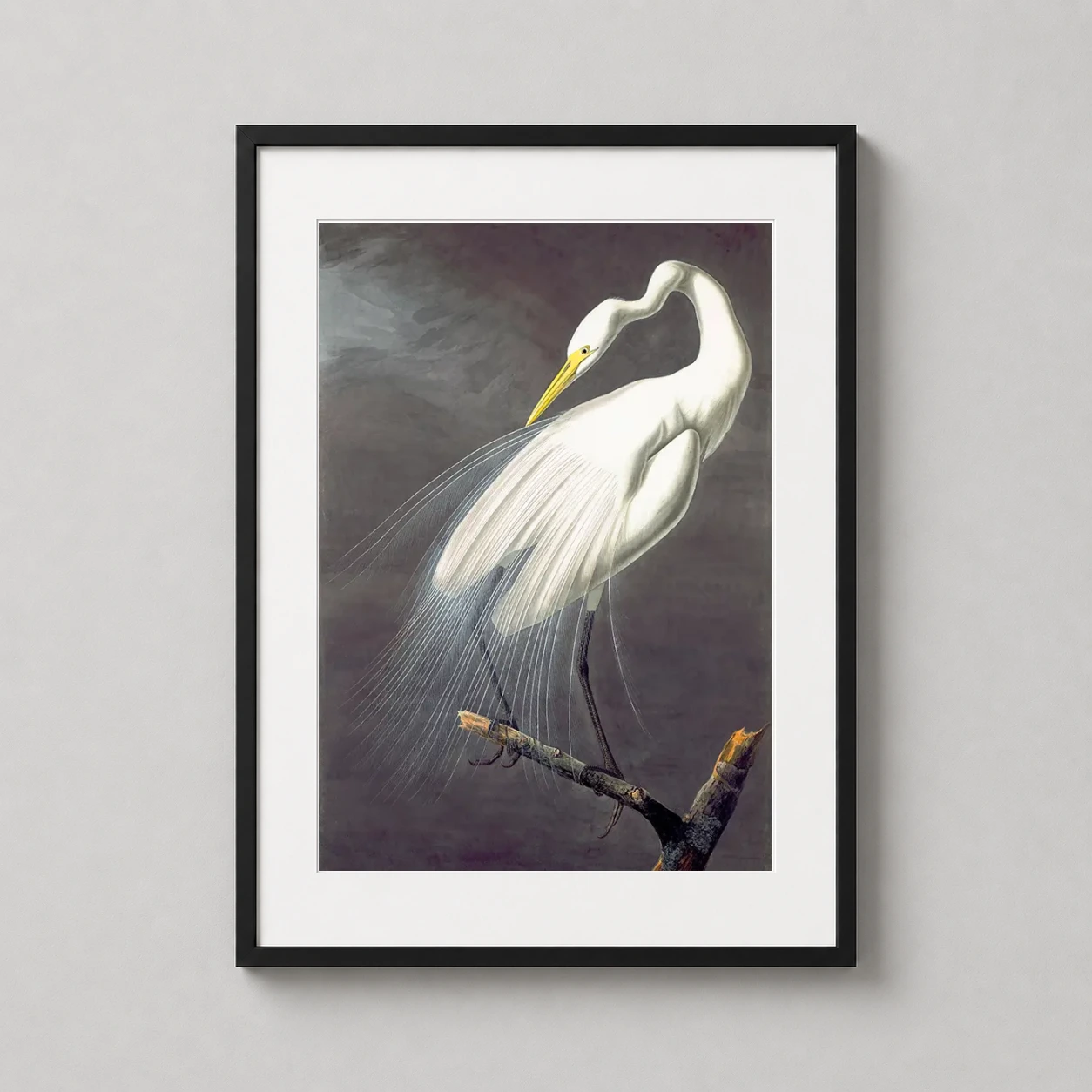 Room mockup of Great Egret Ardea Alba Audubon Illustration Art Print, displayed as framed wall art in a bedroom setting as a portrait print with yellow and white tones.