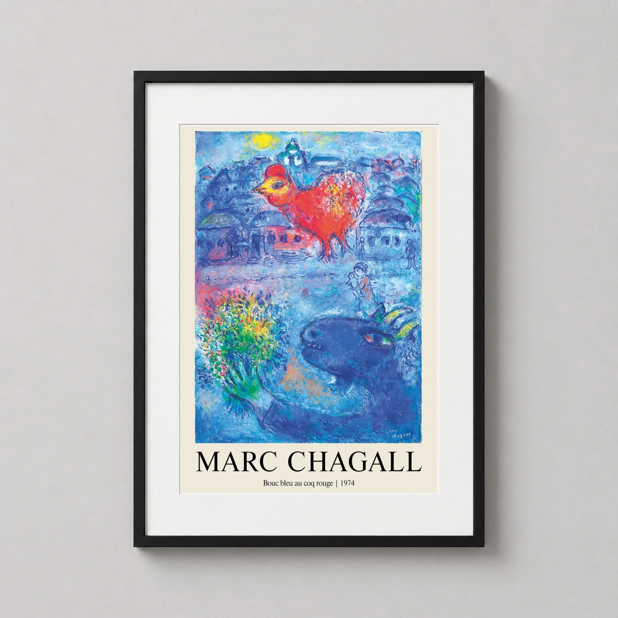 Room mockup of Marc Chagall Blue Goat and Red Rooster 1974 Surrealist Art Print, displayed as framed wall art in a living room setting as a portrait print with blue and red tones.