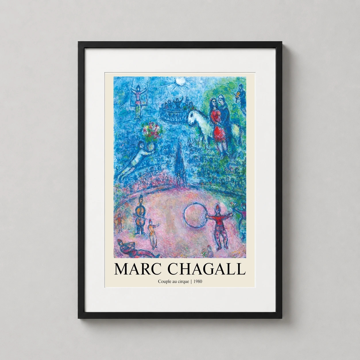 Room mockup of Marc Chagall Couple au cirque, 1980 Surrealist Circus Art Print, displayed as framed wall art in a living room setting as a portrait print with blue, pink, and white tones.
