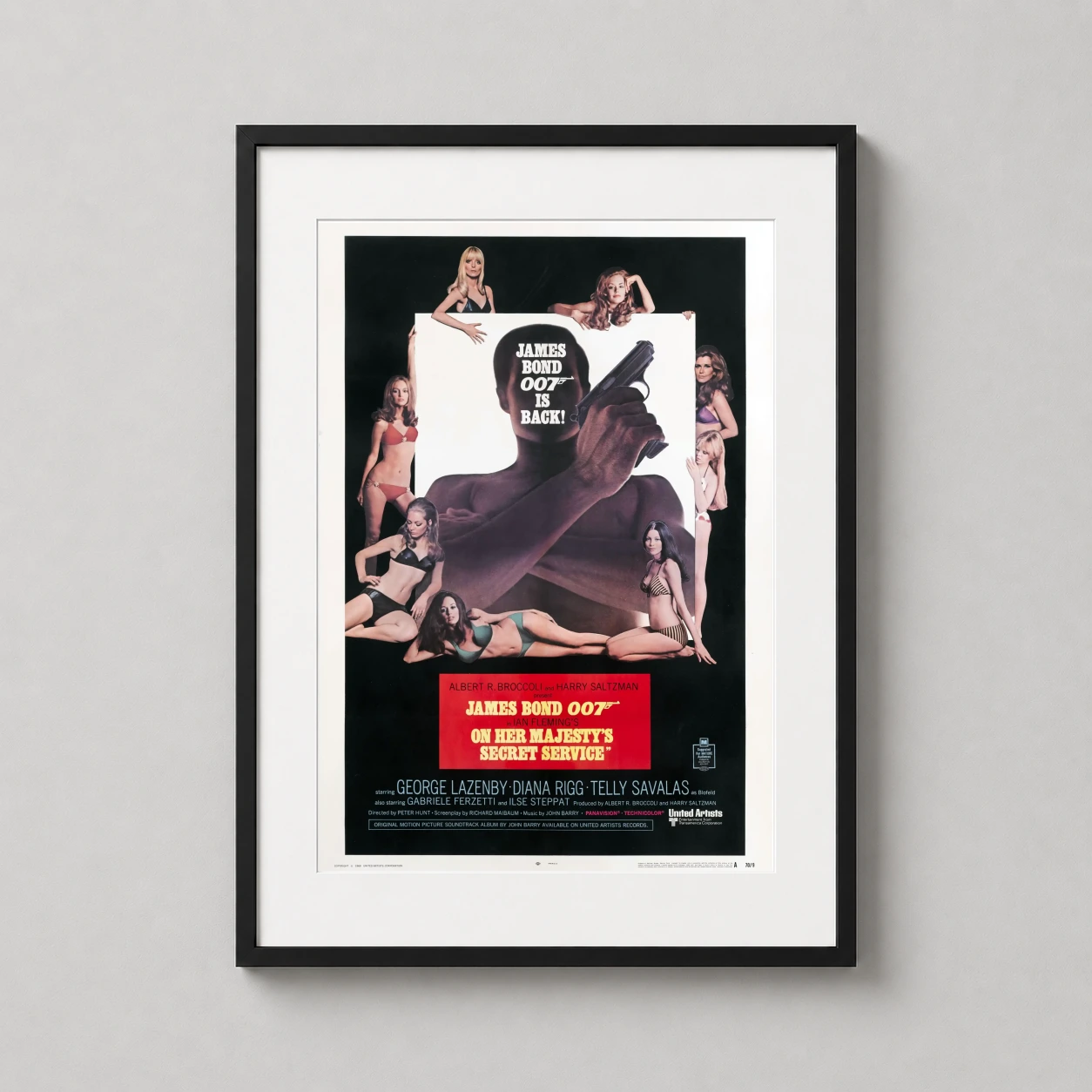 On Her Majesty's Secret Service — this 1969 theatrical print features a silhouetted George Lazenby as