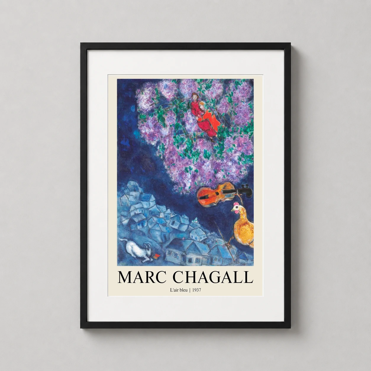 Room mockup of Marc Chagall L'air bleu 1937 Surrealist Village Art Print, displayed as framed wall art in a living room setting as a portrait print with blue and purple tones.
