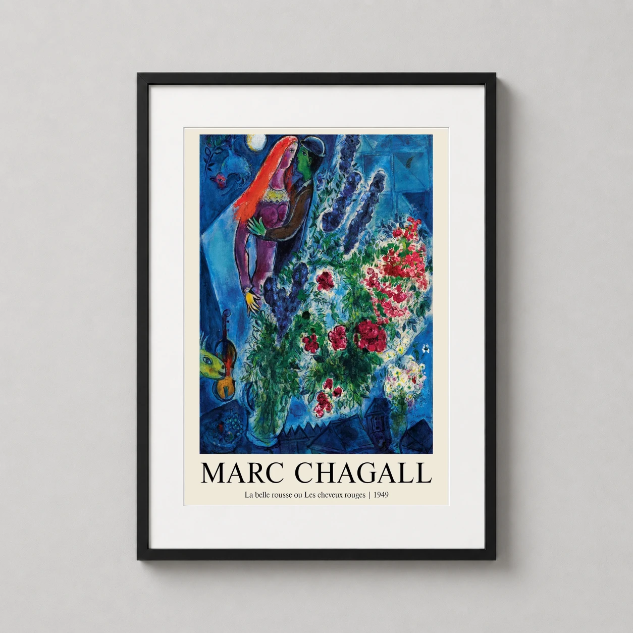 Room mockup of Marc Chagall La Belle Rousse 1949 Modernist Art Print, displayed as framed wall art in a living room setting as a portrait print with blue tones.