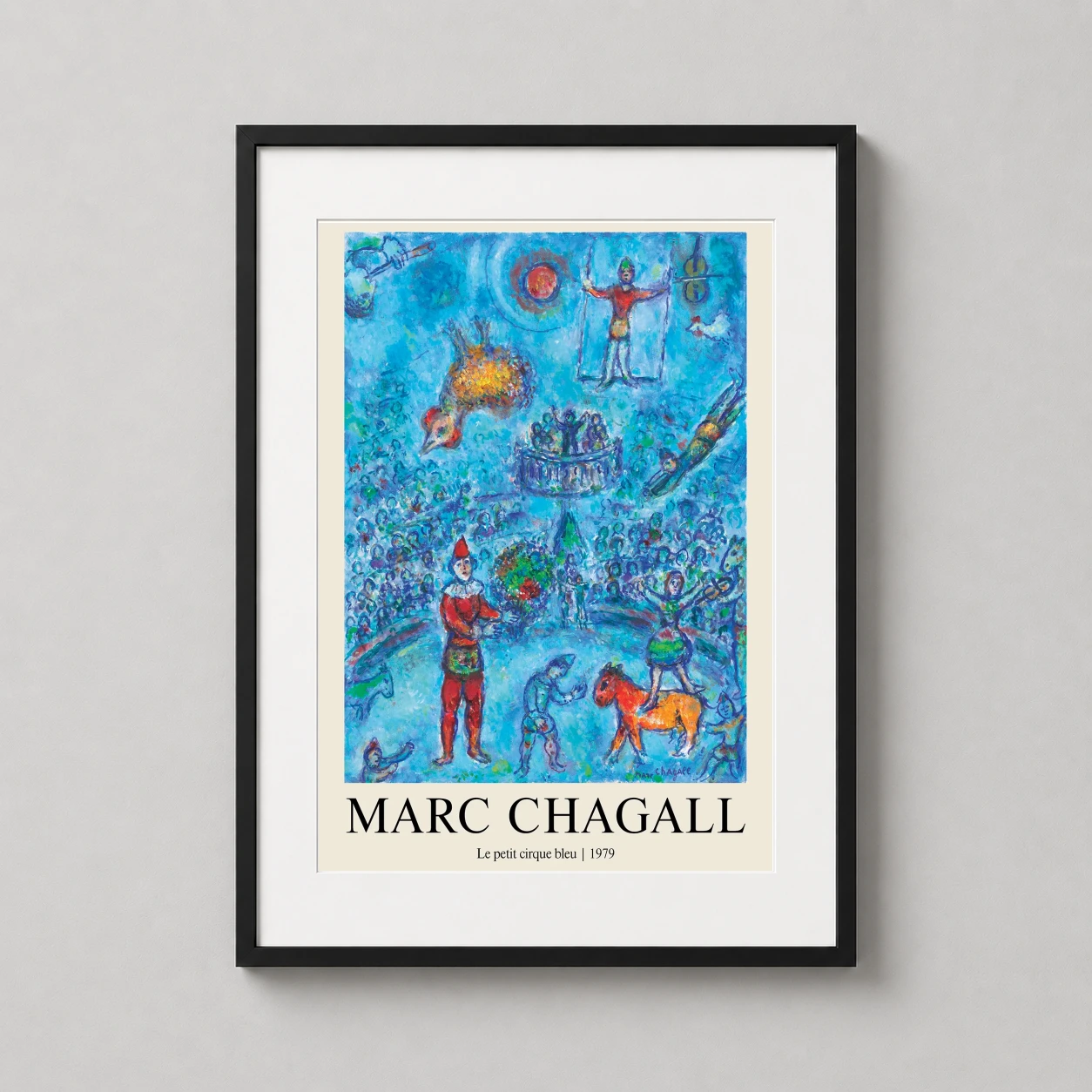 Room mockup of Marc Chagall Le petit cirque bleu 1979 Surrealist Circus Art Print, displayed as framed wall art in a living room setting as a portrait print with blue tones.