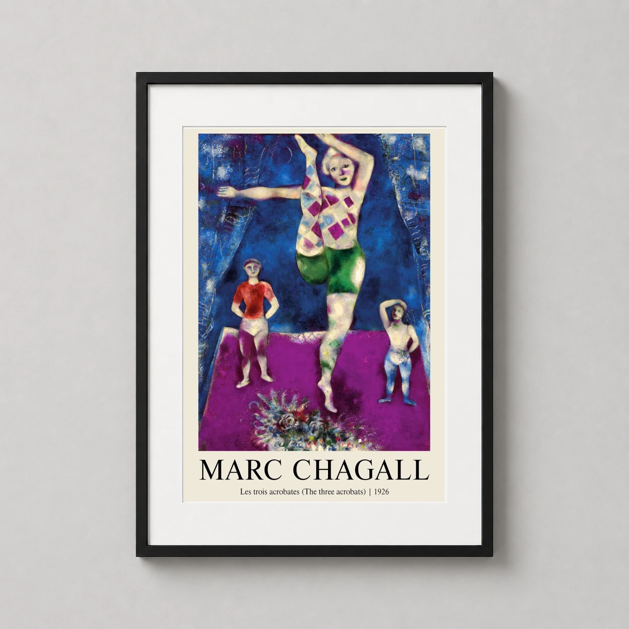 Room mockup of Marc Chagall Les trois acrobates 1926 Circus Fine Art Print, displayed as framed wall art in a living room setting as a portrait print with blue and purple tones.
