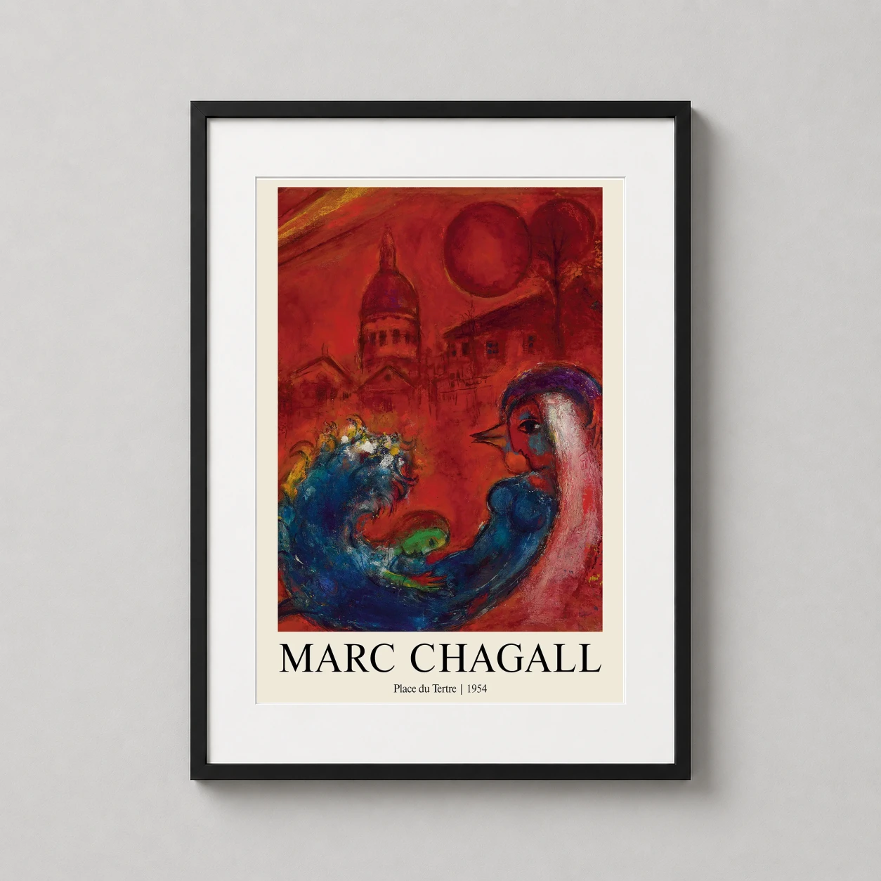 Room mockup of Place du Tertre 1954 Marc Chagall Paris Modernist Art Print, displayed as framed wall art in a living room setting as a portrait print with blue and red tones.