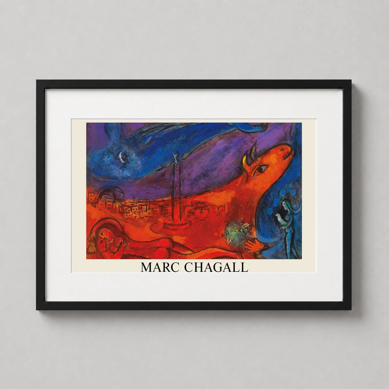 Room mockup of Marc Chagall The Bastille Paris Surrealist Painting Art Print, displayed as framed wall art in a living room setting as a landscape print with blue and red tones.