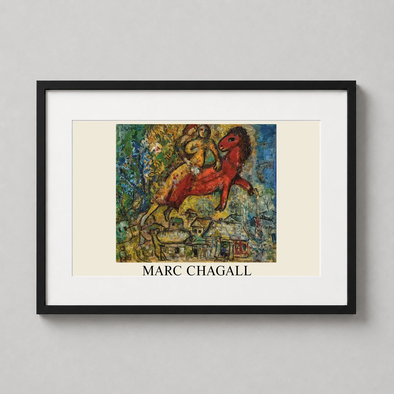 Room mockup of Marc Chagall, La Chevauchée (The Cavalcade) 1956 Art Print, displayed as framed wall art in a living room setting as a landscape print with red tones.