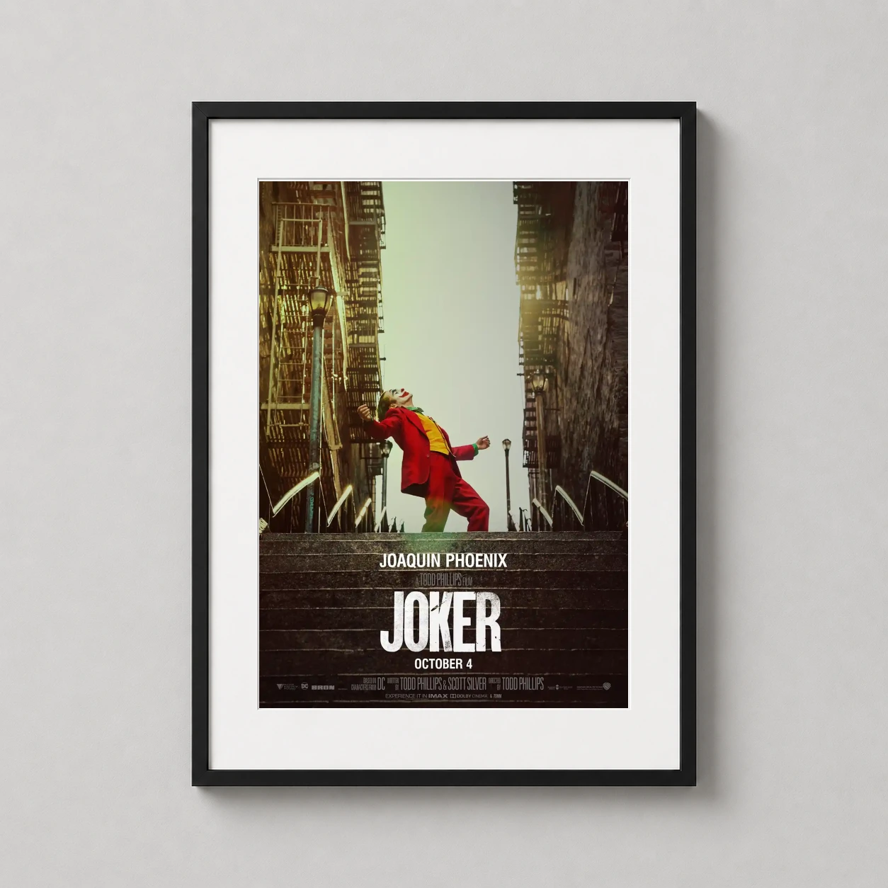 Joker Movie Stairs Dance — cinematic poster featuring the Joker in a red suit dancing on a long