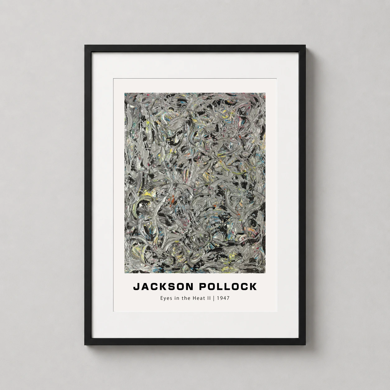 Room mockup of Eyes in the Heat II, 1947, Jackson Pollock Abstract Wall Art Print, displayed as framed wall art in a living room setting as a portrait print with blue, yellow, and red tones.