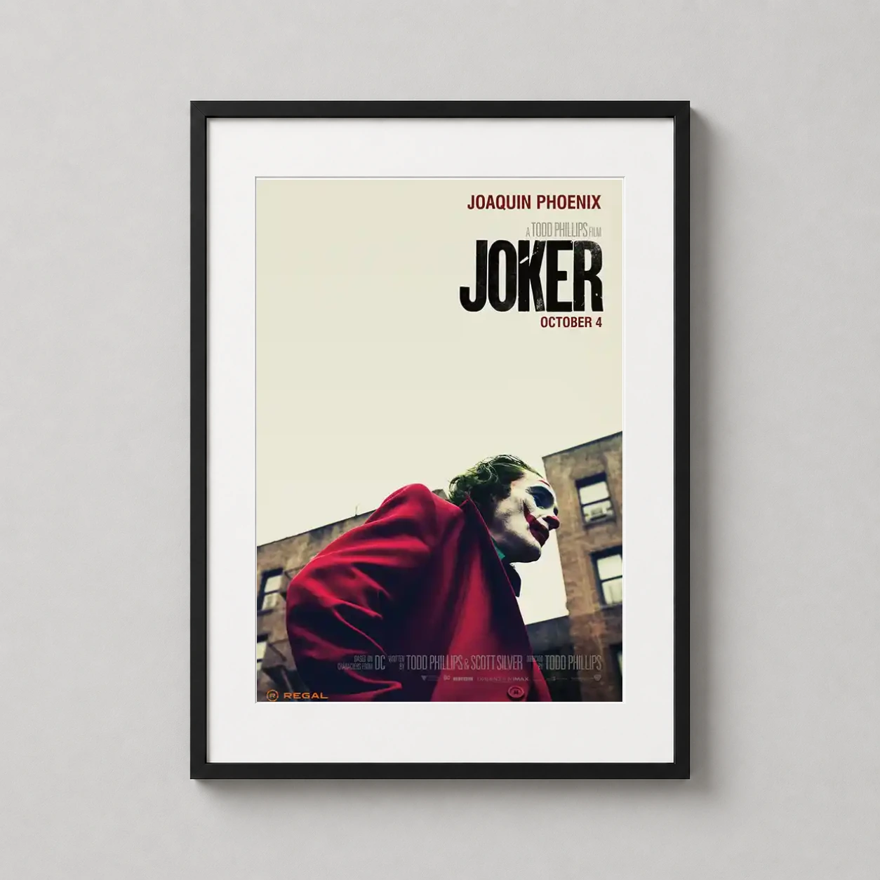 Joker 2019 Joaquin Phoenix — theatrical poster featuring Joaquin Phoenix as the Joker in his red