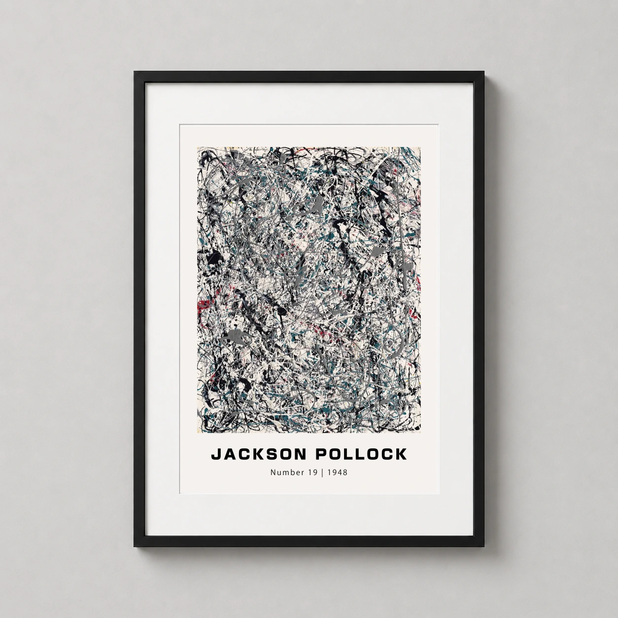 Room mockup of Jackson Pollock Number 19, 1948 Abstract Expressionist Art Print, displayed as framed wall art in a living room setting as a portrait print with blue, red, and grey tones.
