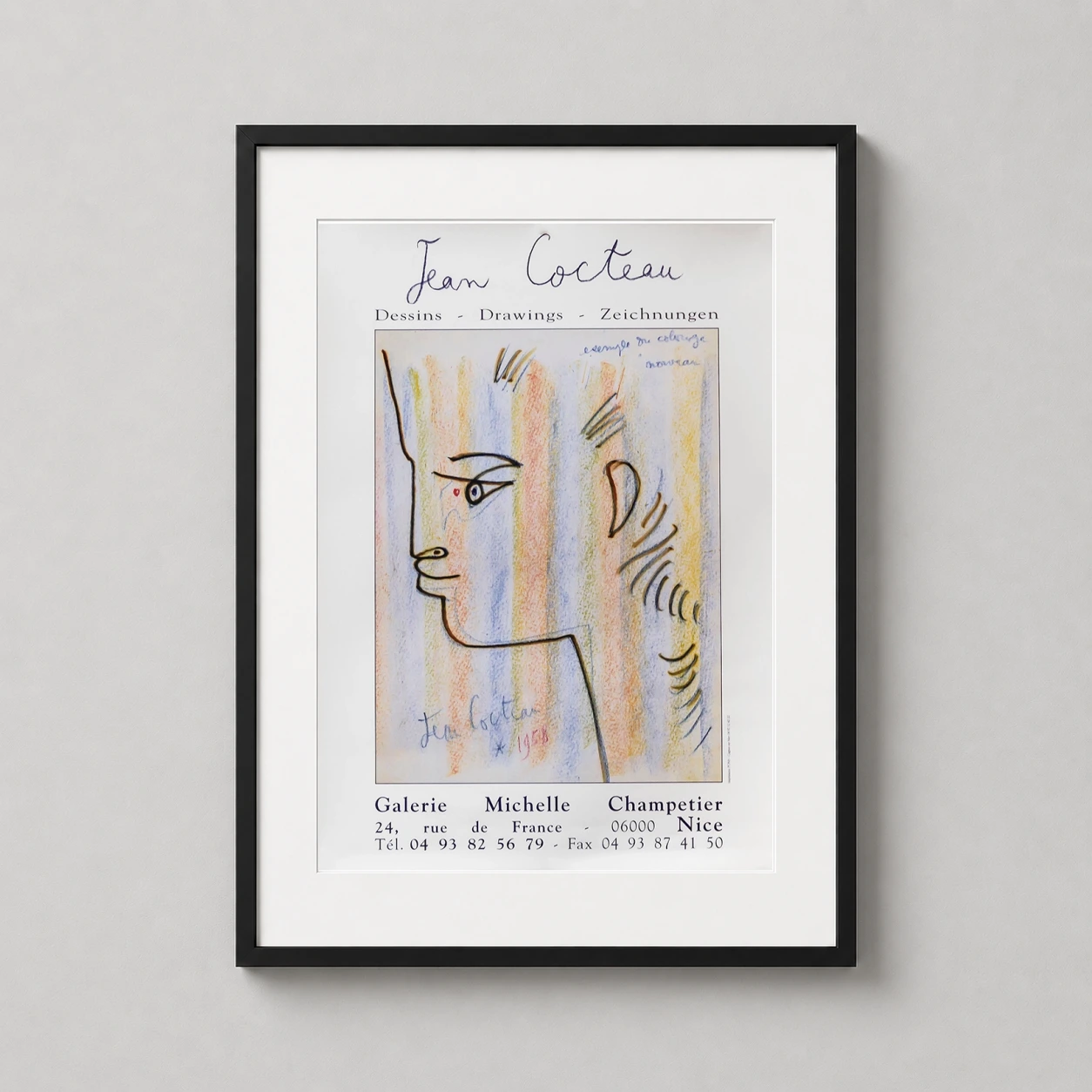 Room mockup of Jean Cocteau Galerie Michelle Champetier Nice Exhibition Art Print, displayed as framed wall art in a living room setting as a portrait print with blue and yellow tones.