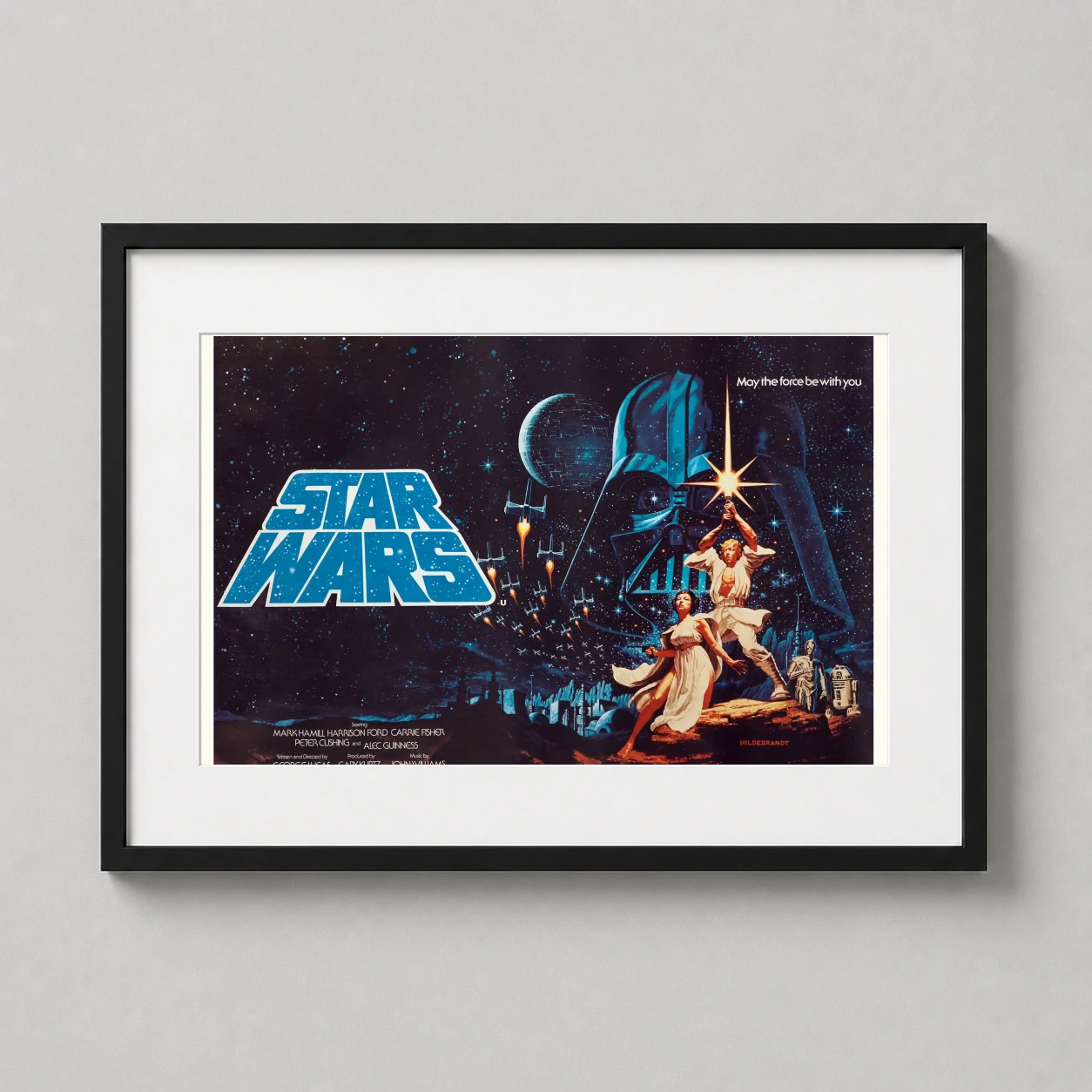 Room mockup of Star Wars A New Hope 1977 Style B Hildebrandt Movie Poster, displayed as framed wall art in a home theater setting as a landscape print with blue tones.