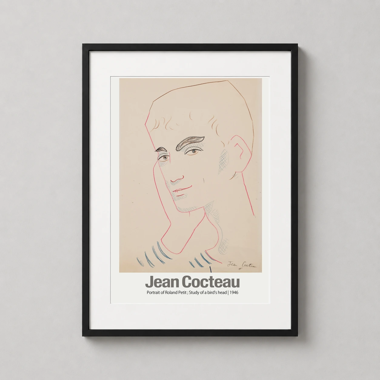 Room mockup of Jean Cocteau Roland Petit Portrait 1946 Modern Sketch Art Print, displayed as framed wall art in a living room setting as a portrait print with blue and pink tones.