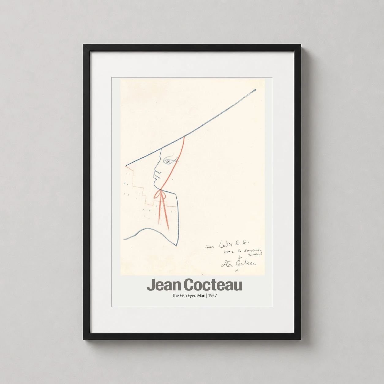 Room mockup of Jean Cocteau, The Fish-Eyed Man 1957 Surrealist Art Print, displayed as framed wall art in a living room setting as a portrait print with blue, red, and cream tones.