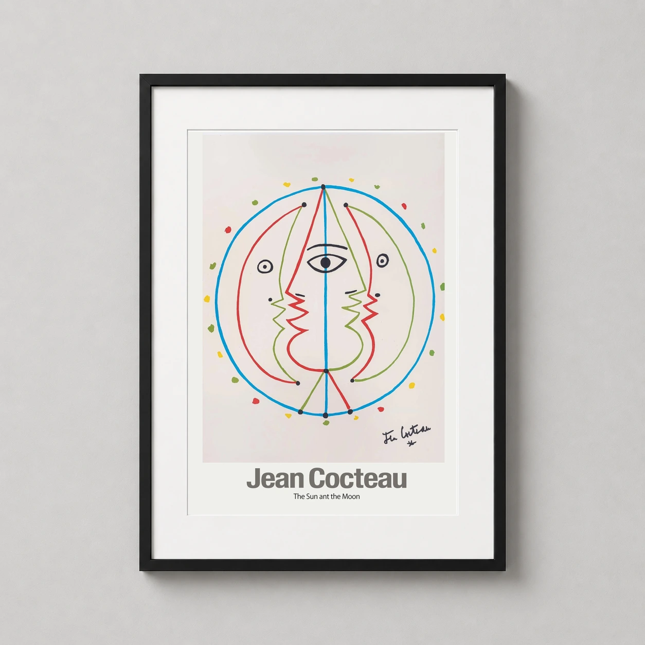 Room mockup of Jean Cocteau The Sun and the Moon Surrealist Abstract Art Print, displayed as framed wall art in a living room setting as a portrait print with blue, green, and yellow tones.