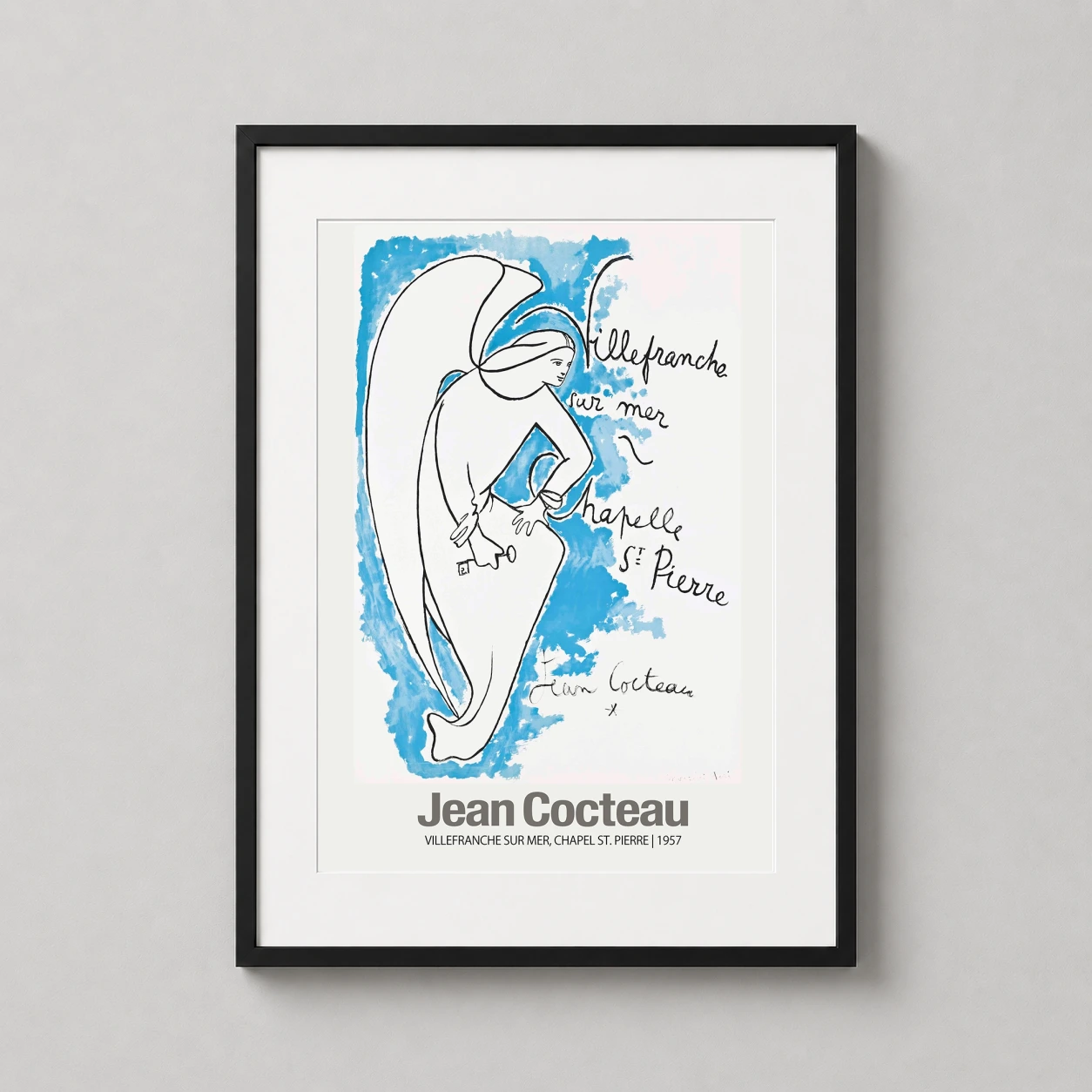 Room mockup of Jean Cocteau Villefranche-sur-mer Chapel St Pierre 1957 Art Print, displayed as framed wall art in a living room setting as a portrait print with blue tones.