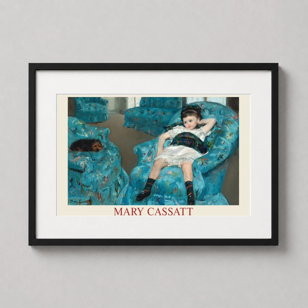 Room mockup of Little Girl in a Blue Armchair by Mary Cassatt Impressionist Art Print, displayed as framed wall art in a living room setting as a landscape print with blue tones.