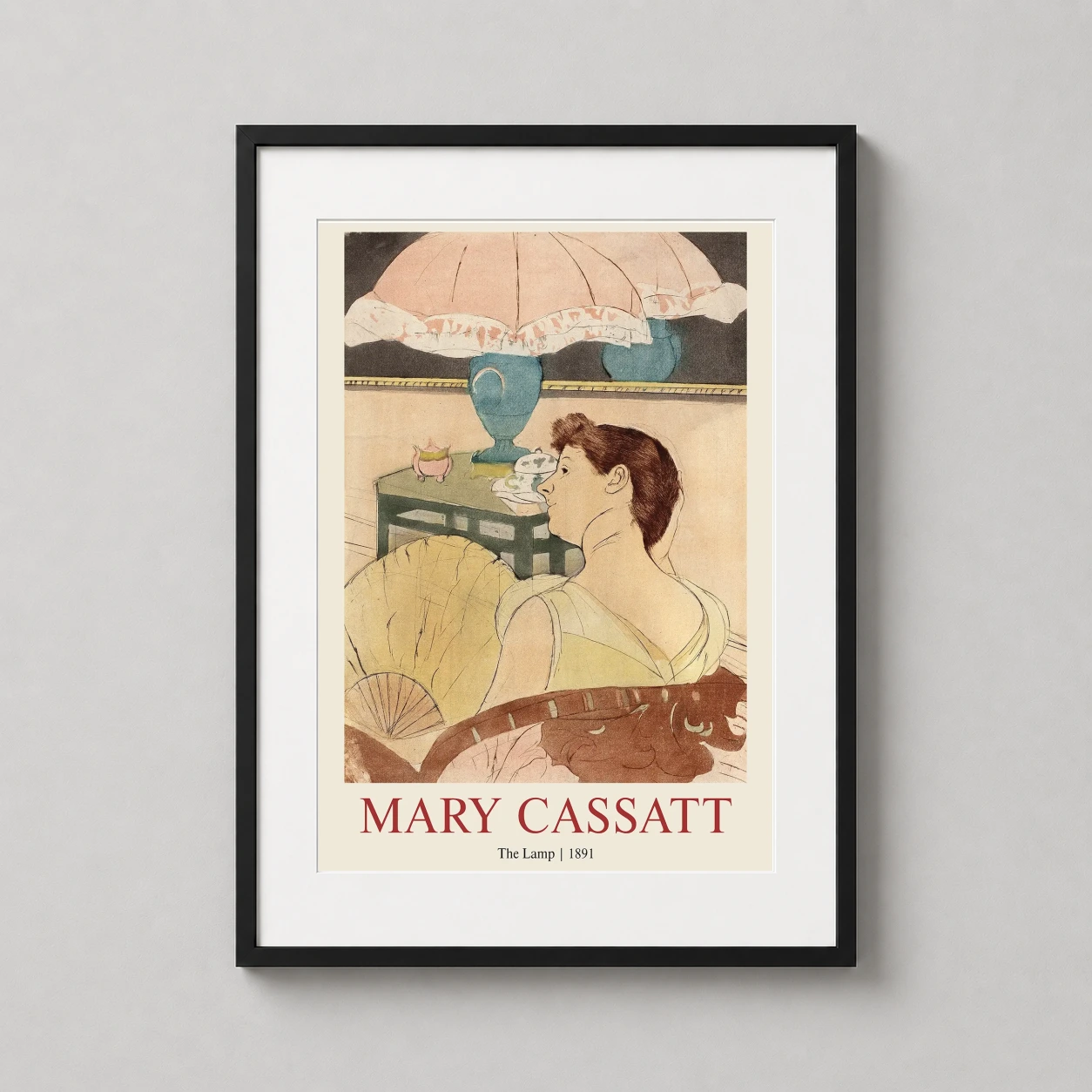 Room mockup of Mary Cassatt The Lamp 1891 Impressionist Masterpiece Art Print, displayed as framed wall art in a bedroom setting as a portrait print with blue, teal, and pink tones.