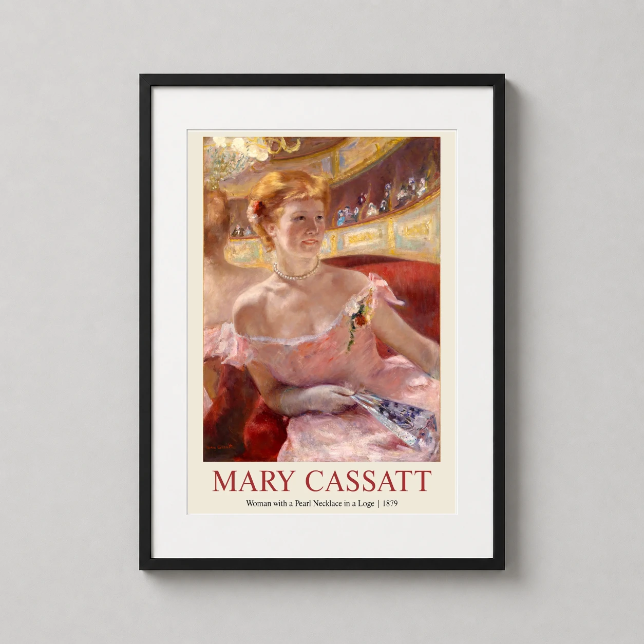 Room mockup of Woman with a Pearl Necklace in a Loge by Mary Cassatt Art Print, displayed as framed wall art in a living room setting as a portrait print with gold and pink tones.
