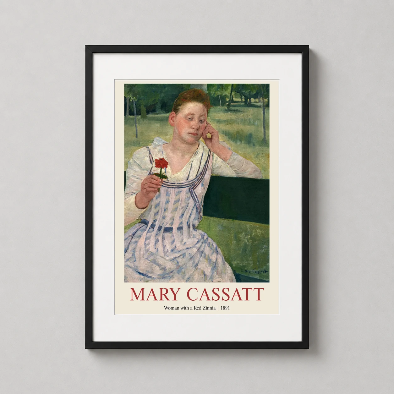 Room mockup of Mary Cassatt Woman with a Red Zinnia 1891 Impressionist Art Print, displayed as framed wall art in a living room setting as a portrait print with blue, green, and red tones.