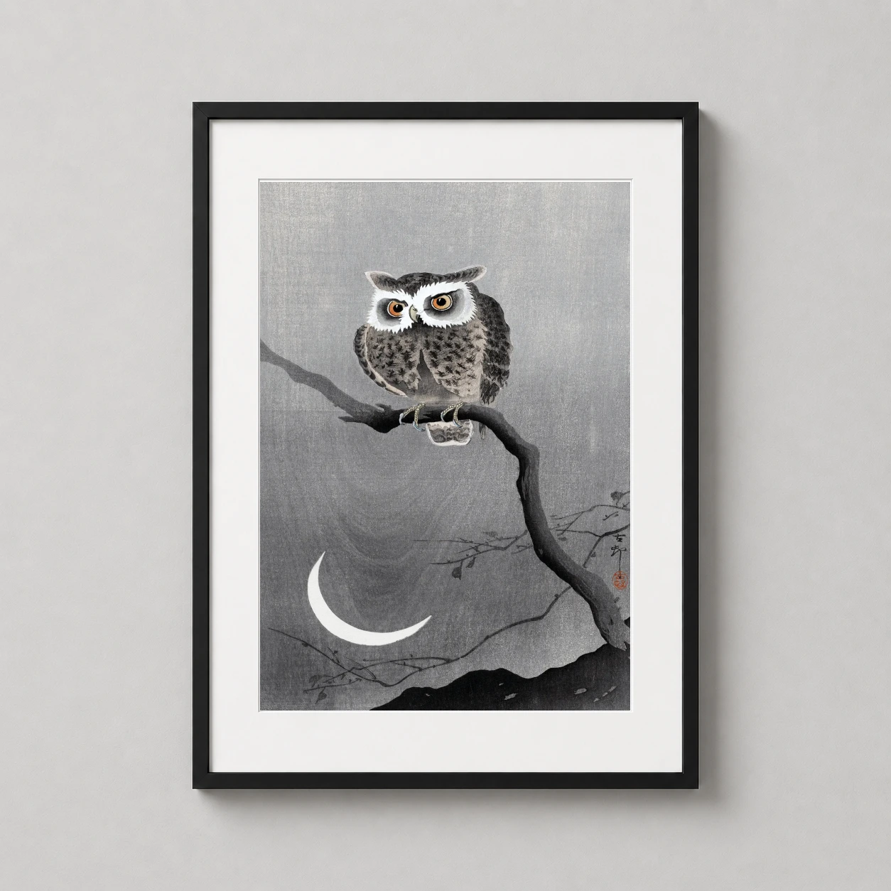 Room mockup of Long-Eared Owl on Tree Branch Japanese Woodblock Art Print, displayed as framed wall art in a bedroom setting as a portrait print with orange and grey tones.