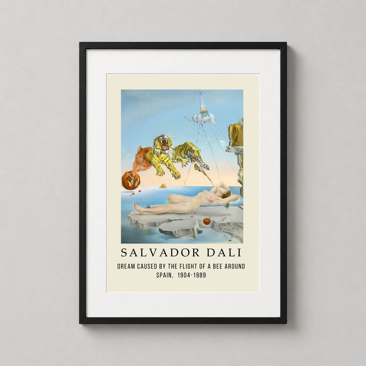 Room mockup of Dream Caused by the Flight of a Bee, Salvador Dali Art Print, displayed as framed wall art in a living room setting as a portrait print with blue tones.