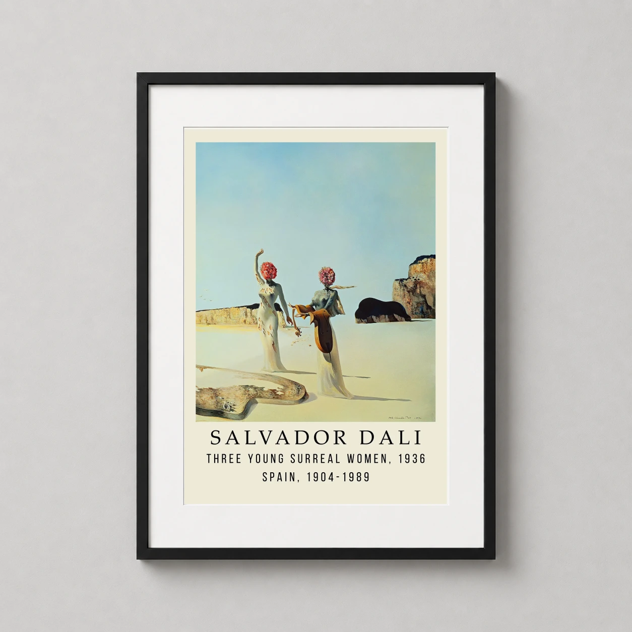 Room mockup of Salvador Dali Three Young Surreal Women 1936 Surrealist Art Print, displayed as framed wall art in a living room setting as a portrait print with blue tones.