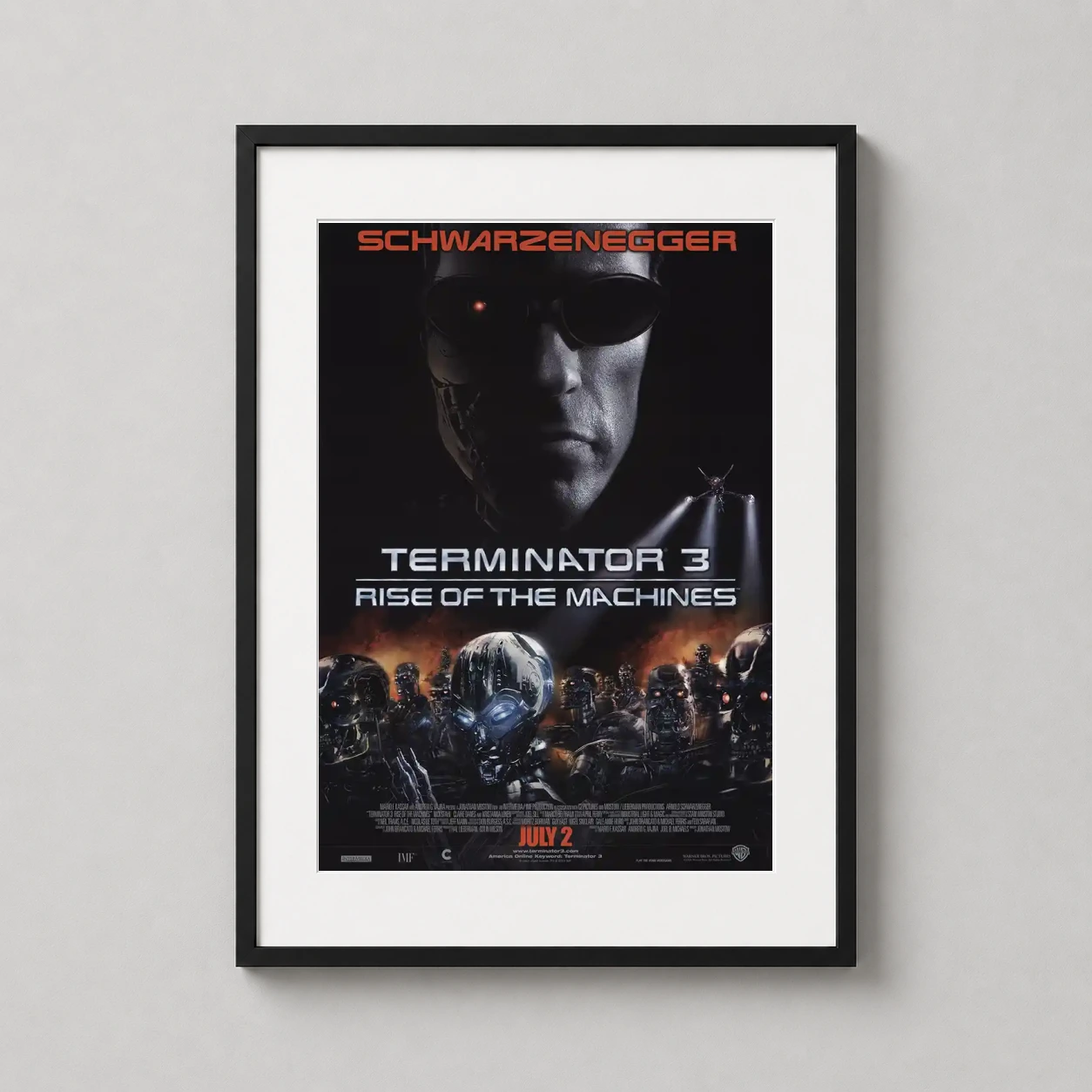 Room mockup of Terminator 3 Rise of the Machines Movie Poster, displayed as framed wall art in a home theater setting as a portrait print with orange and red tones.