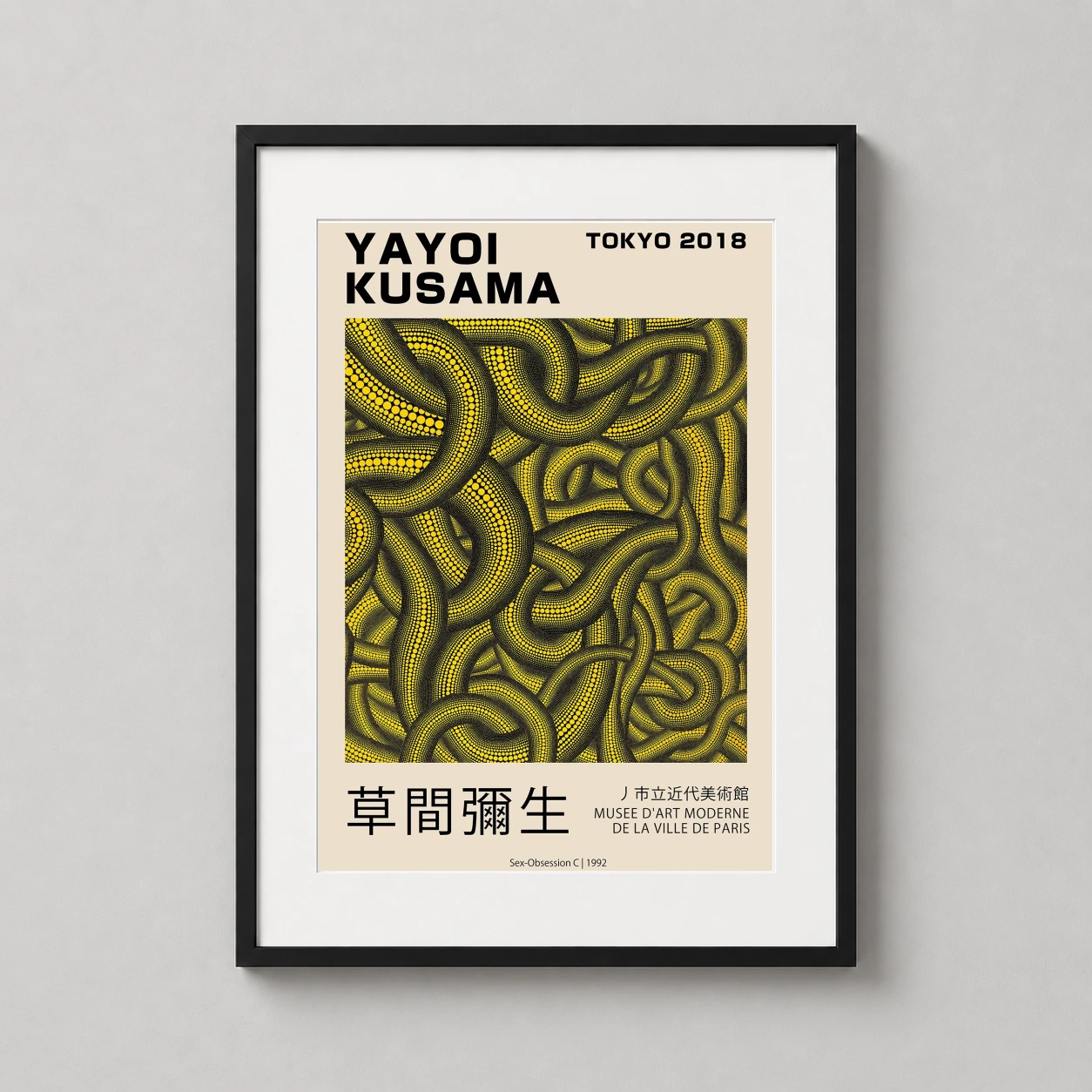 Room mockup of Yayoi Kusama Sex Obsession C 1992 Yellow Polka Dot Art Print, displayed as framed wall art in a living room setting as a portrait print with yellow and black tones.