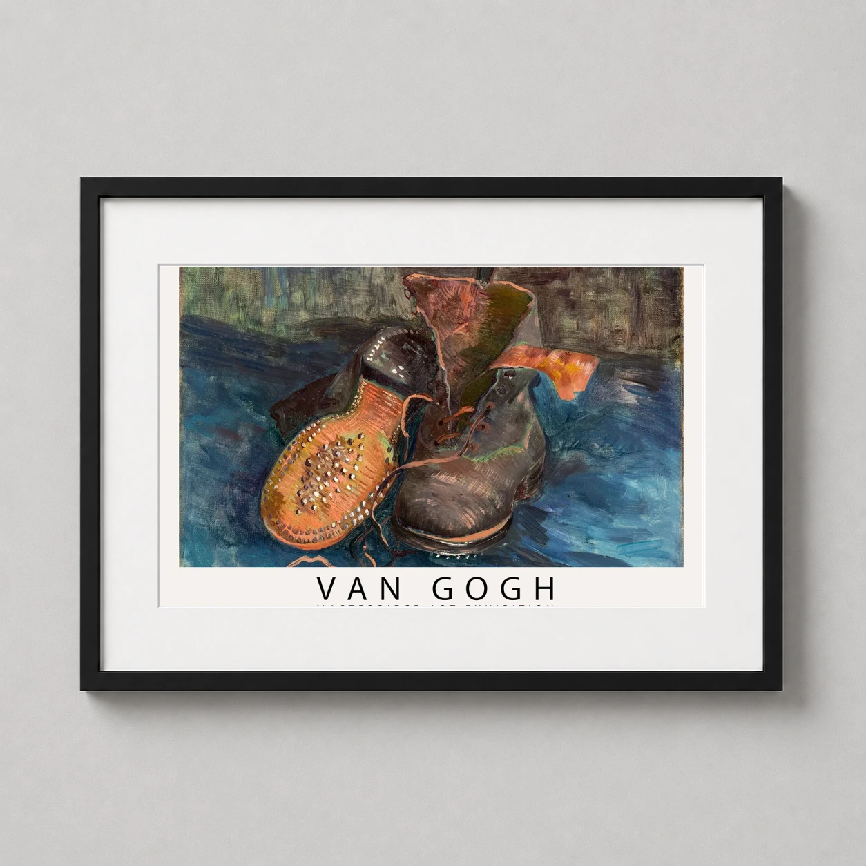 Room mockup of Van Gogh A Pair of Boots Exhibition Poster, Fine Art Print, displayed as framed wall art in a living room setting as a landscape print with blue and brown tones.