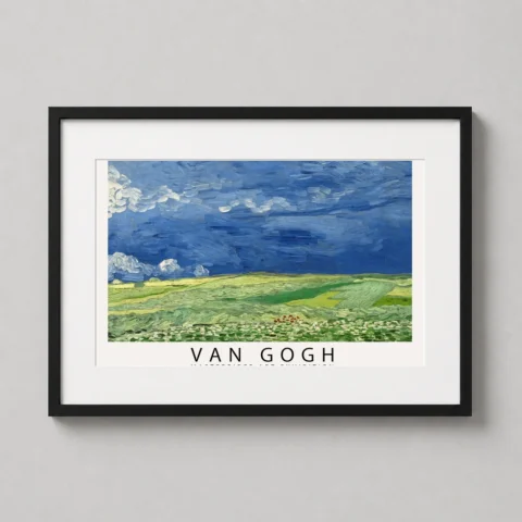 A framed Van Gogh wheatfield landscape print hanging on a neutral living room wall above a modern wooden sideboard.