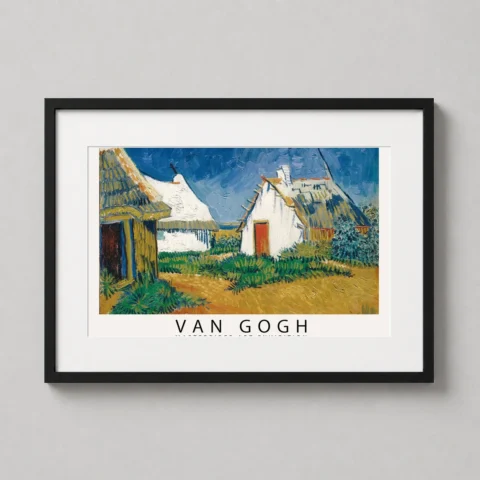 A framed Saintes-Maries art print by Van Gogh hangs in a minimalist living room above a wooden sideboard.