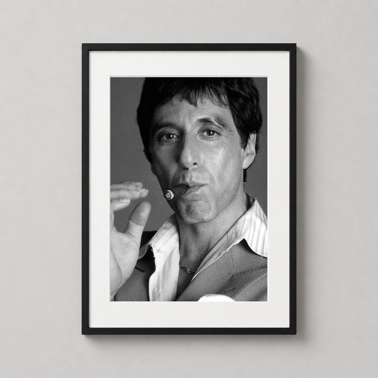 Al Pacino Smoking — high-contrast black and white portrait of Al Pacino smoking a cigar