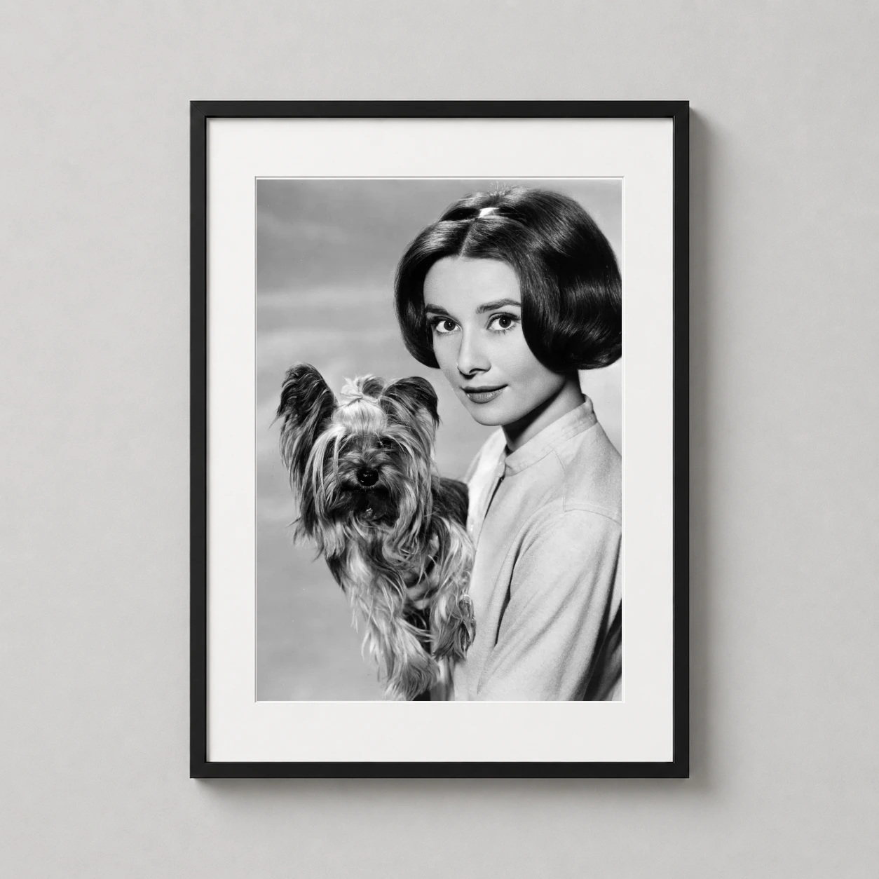 Audrey Hepburn — high-contrast black and white portrait featuring Audrey Hepburn