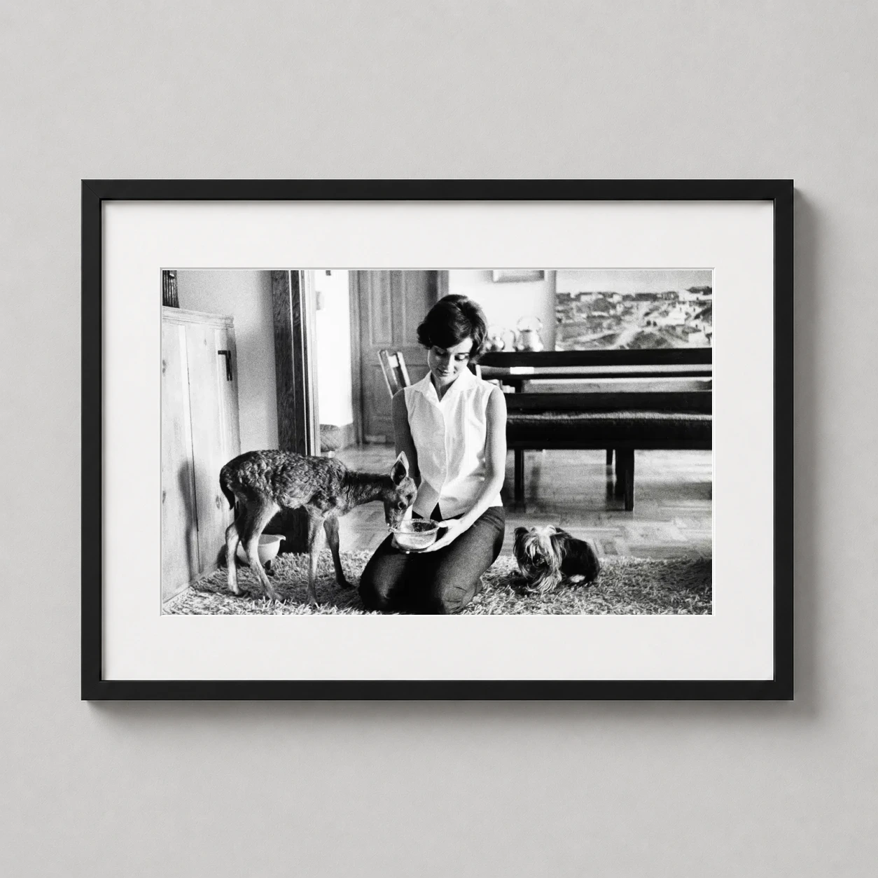 Audrey Hepburn — black and white photography print capturing Audrey Hepburn kneeling on