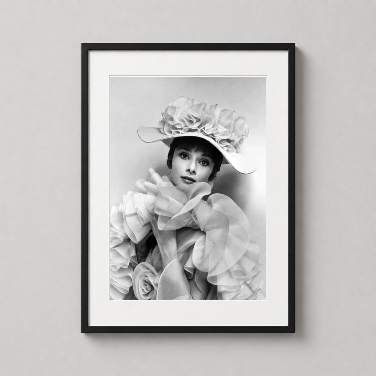 Audrey Hepburn Eliza Doolittle — high-contrast black and white photographic portrait of Audrey Hepburn
