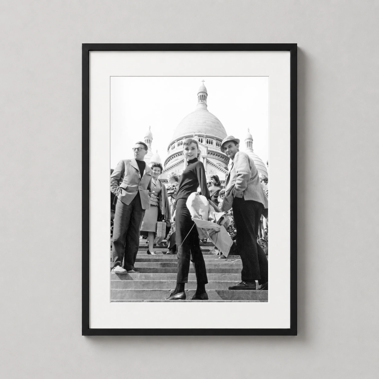 Audrey Hepburn Funny Face — audrey Hepburn stands on the Sacre-Coeur steps in Paris during the