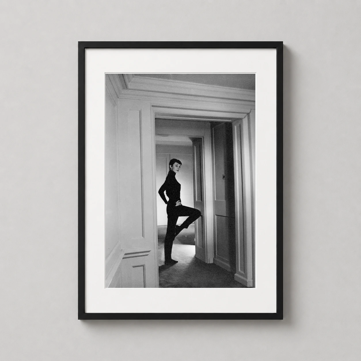 Audrey Hepburn 1955 Hallway — this black and white archival print features Audrey Hepburn in 1955