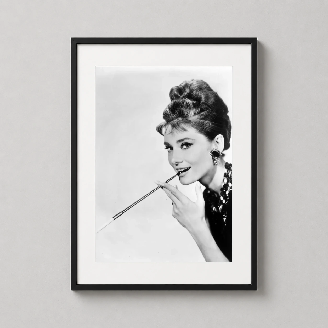 Audrey Hepburn Breakfast Tiffany's — classic black and white photography print featuring Audrey Hepburn with