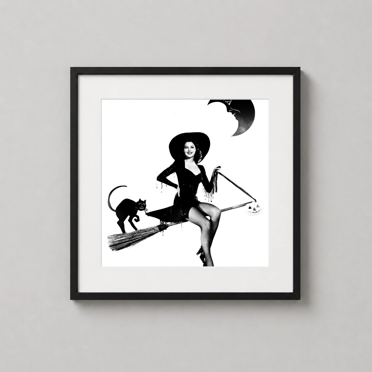 Ava Gardner Witch Halloween Pin — playful black and white studio portrait featuring Ava Gardner as a