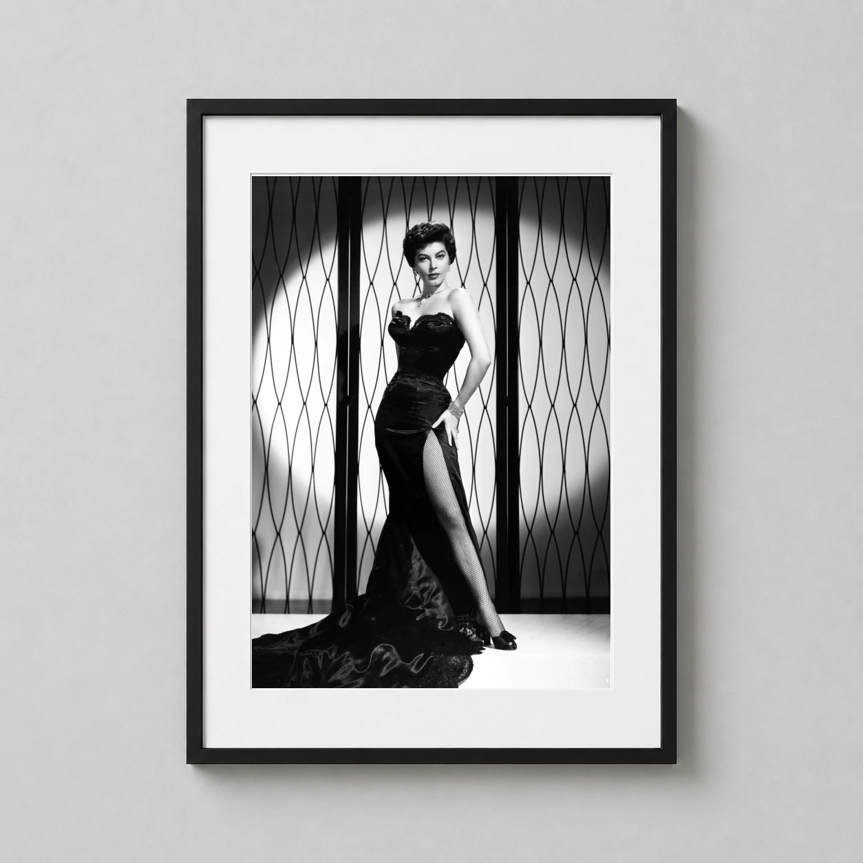 Ava Gardner Black Evening — high-contrast studio portrait of Ava Gardner wearing a strapless black