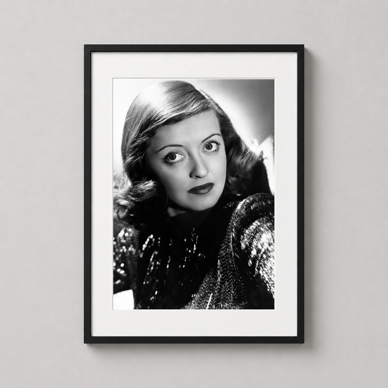 Bette Davis 1960s Hollywood — striking black and white portrait of Bette Davis from the 1960s