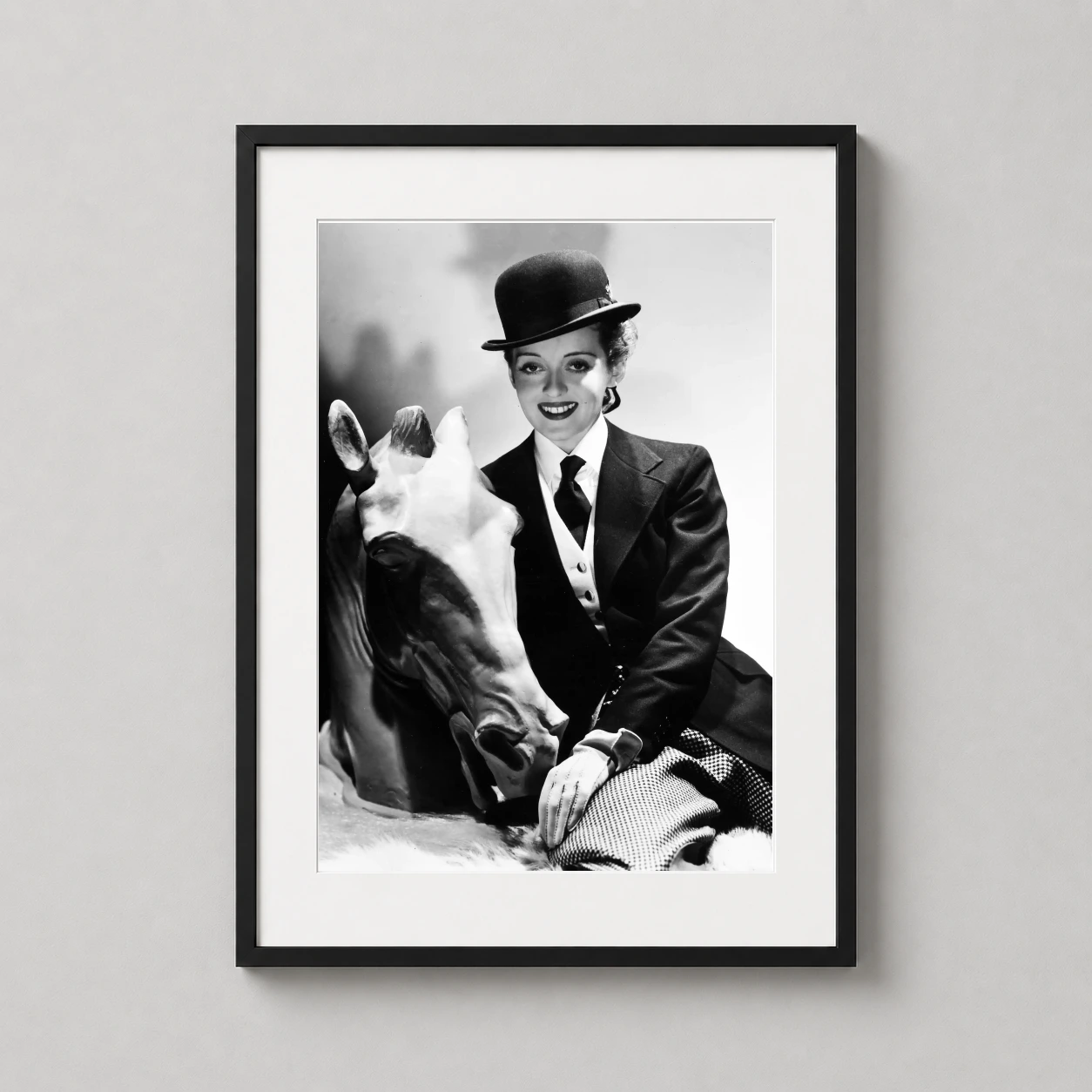 Bette Davis Hollywood in — sharp black and white studio portrait of Bette Davis in an equestrian