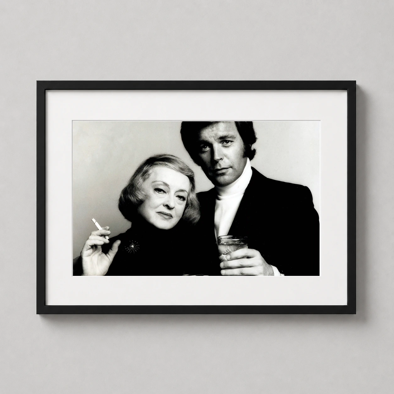 Bette Davis Robert Wagner — sophisticated black and white portrait of Hollywood legends Bette Davis