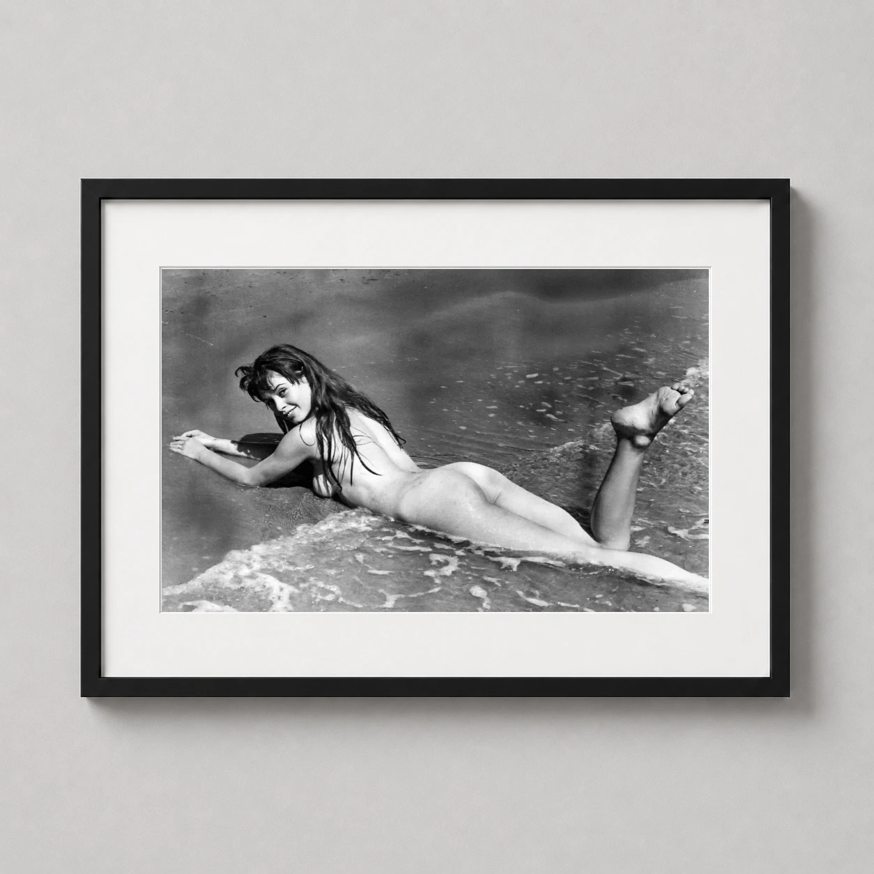 Brigitte Bardot Surf Portrait — monochrome photography print capturing Brigitte Bardot lying in the