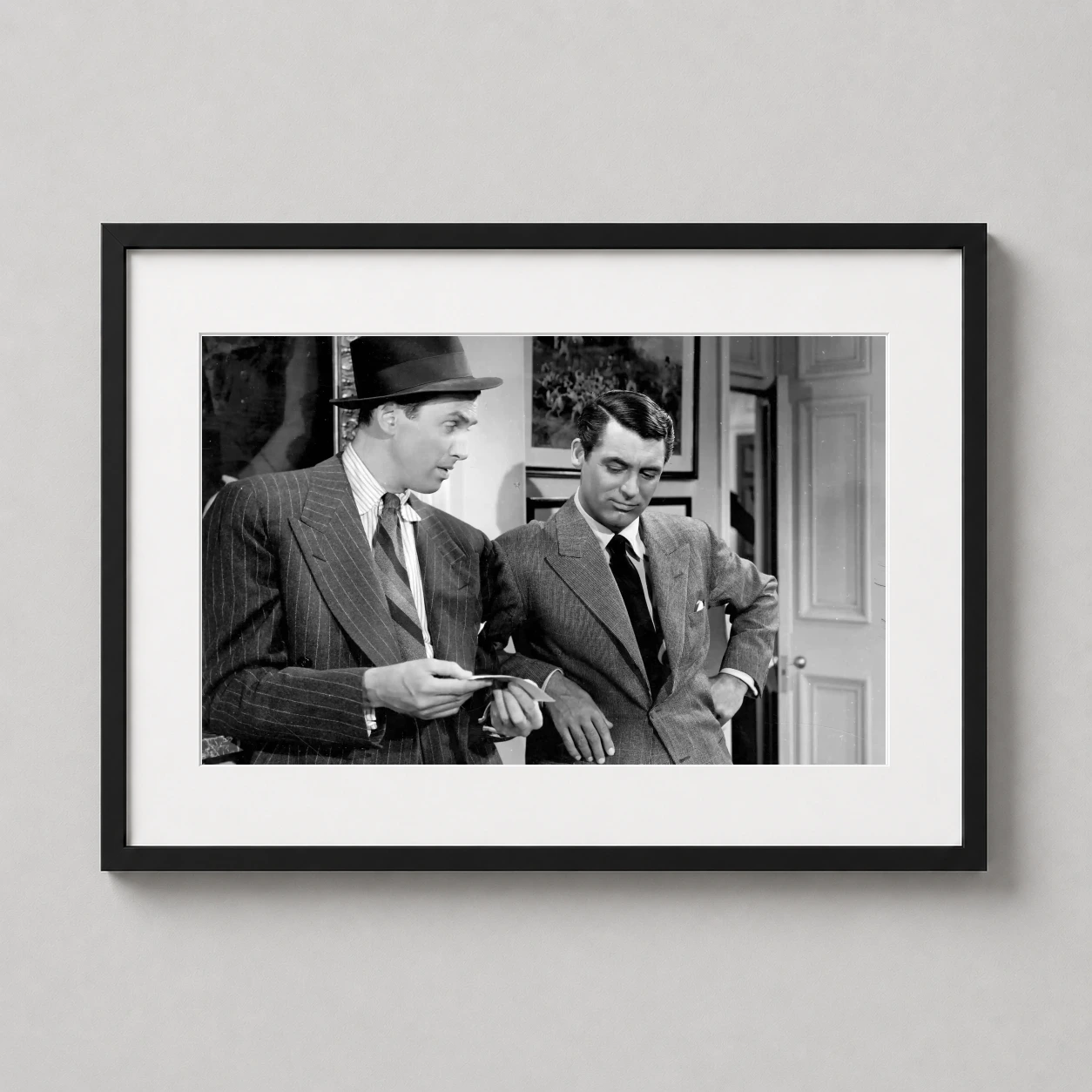 Philadelphia Story — black and white film still featuring Cary Grant and James Stewart in