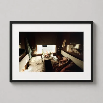 David Bowie asleep on train print showing a 1973 signed-photo description of Bowie asleep on a train as David Bowie themed